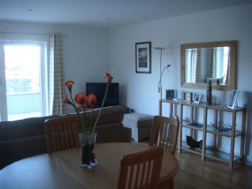 View from kitchen to lounge area and terrace